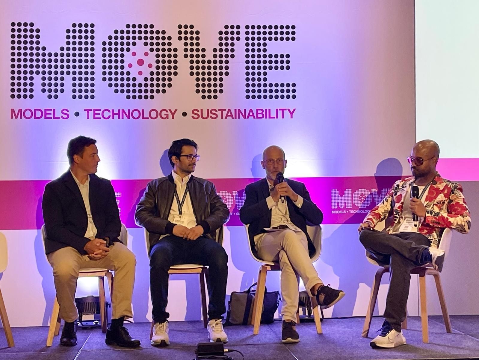 Masoom Kumar speaking at an AI conference