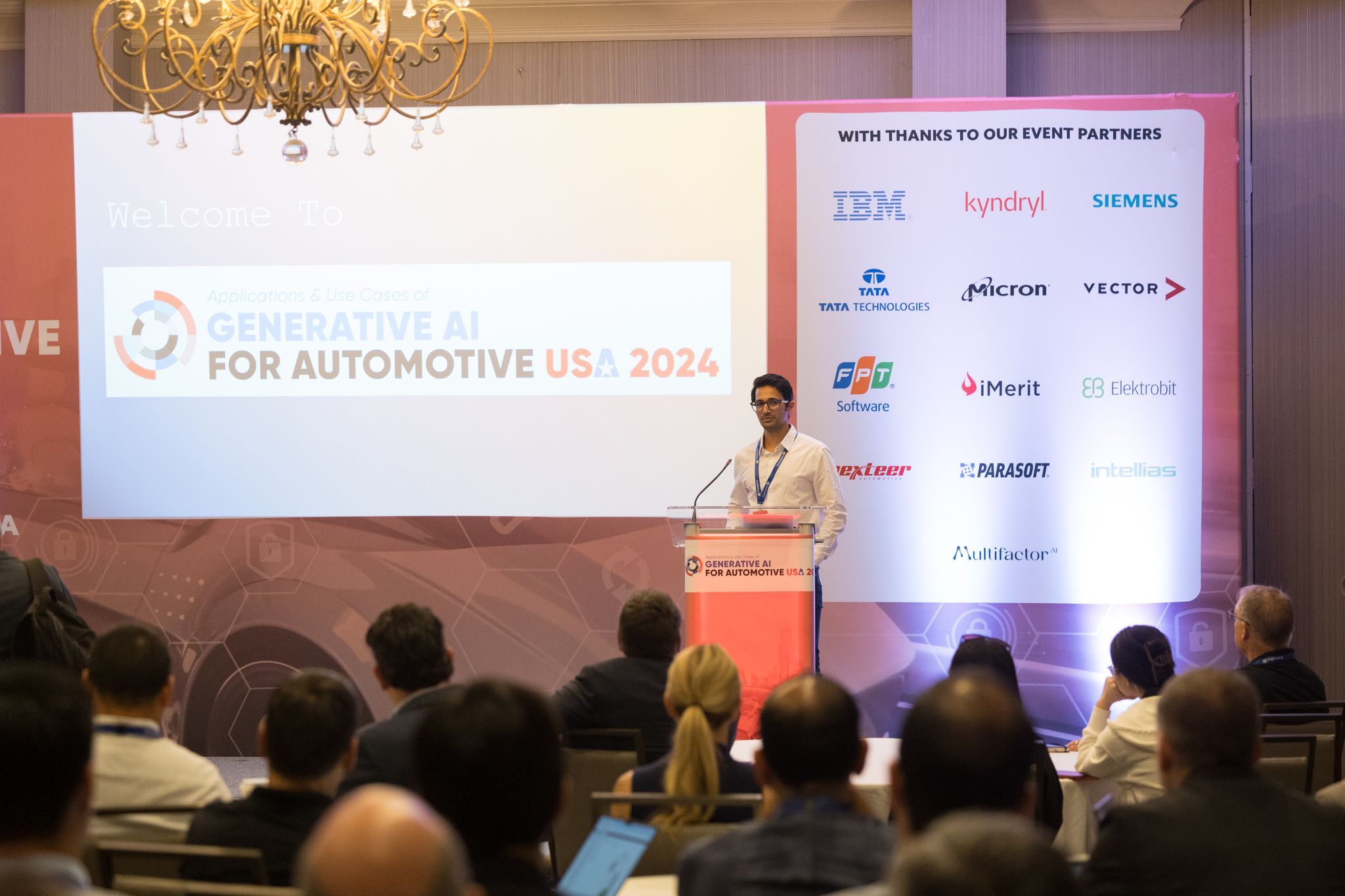 Masoom Kumar presenting at an AI conference